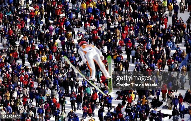 Winter Olympic Games : Salt Lake City, Saut, Schansspringen, 2/13/02, Park City, Utah, United States --- A Competitor Flies High Over The Crowd Of...