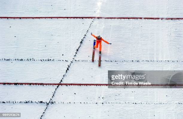 Winter Olympic Games : Salt Lake City, 1/13/02, Park City, Utah, United States --- Kazuyoshi Funaki Flies High Over The Olympic Rings During The Ski...