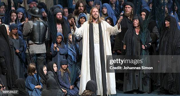 Andreas Richter as Jesus Christ and ensemble members perform on stage during the Oberammergau passionplay 2010 final dress rehearsal on May 10, 2010...