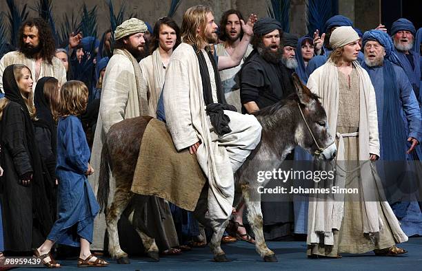 Andreas Richter as Jesus Christ and ensemble members perform on stage during the Oberammergau passionplay 2010 final dress rehearsal on May 10, 2010...