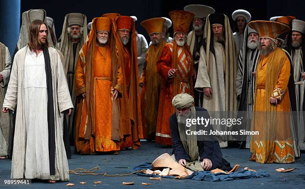 Frederik Mayet as Jesus Christ and ensemble members perform on stage during the Oberammergau passionplay 2010 final dress rehearsal on May 10, 2010...
