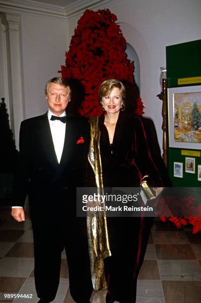 Film director Mike Nichols and his wife ABC television news anchor Diane Sawyer arrive in the book sellers lobby of the White House to attend the...