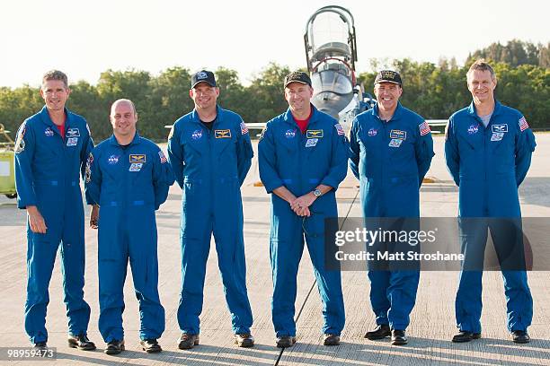 Space Shuttle Atlantis astronauts mission specialists Michael Good and Garrett Reisman, Pilot Tony Antonelli, Commander Ken Ham, mission specialists...