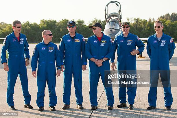 Space Shuttle Atlantis astronauts mission specialists Michael Good and Garrett Reisman, Pilot Tony Antonelli, Commander Ken Ham, mission specialists...