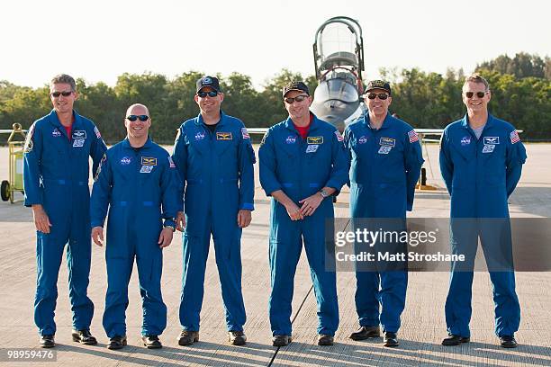 Space Shuttle Atlantis astronauts mission specialists Michael Good and Garrett Reisman, Pilot Tony Antonelli, Commander Ken Ham, mission specialists...