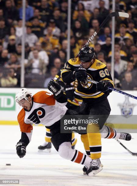 Vladimir Sobotka of the Boston Bruins and Danny Briere of the Philadelphia Flyers collide in Game Five of the Eastern Conference Semifinals during...