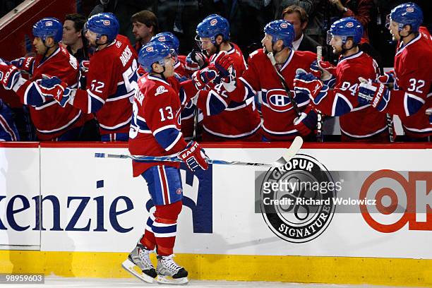 Mike Cammalleri of the Montreal Canadiens celebrates his first-period goal with teammates in Game Six of the Eastern Conference Semifinals against...