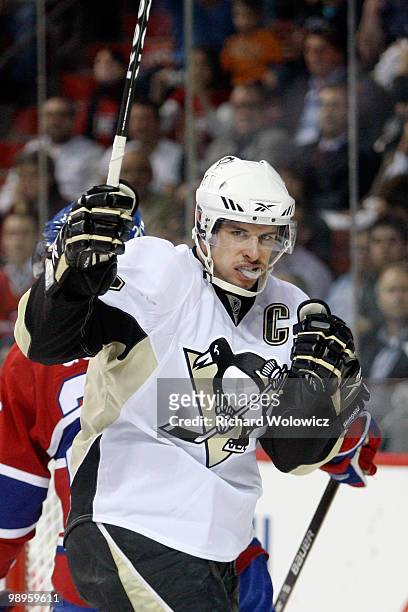 Sidney Crosby of the Pittsburgh Penguins celebrates his first-period goal against the Montreal Canadiens in Game Six of the Eastern Conference...