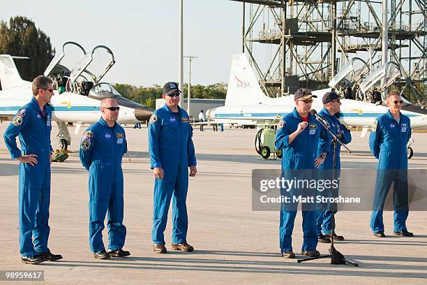 Space Shuttle Atlantis astronauts mission specialists Michael Good and Garrett Reisman, Pilot Tony Antonelli, Commander Ken Ham, mission specialists...