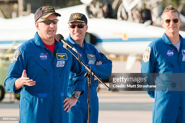 Space Shuttle Atlantis Commander Ken Ham and mission specialists Steve Bowen and Piers Sellers address the media after arriving at the shuttle...