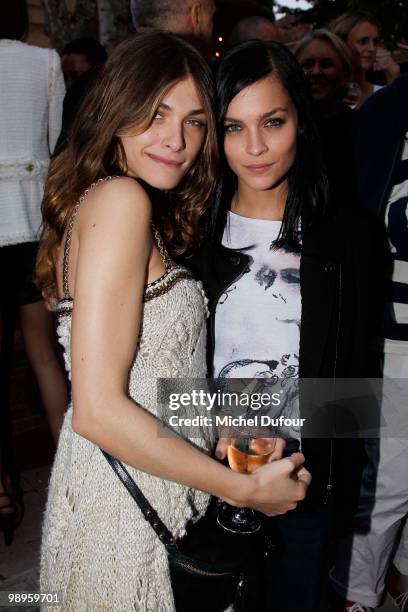 Elisa Sednaoui and Leigh Lezark play bowling at place des Lices on May 10, 2010 in Saint-Tropez, France.