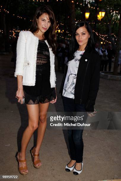 Caroline Zieber and Leigh Lezark play bowling at place des Lices on May 10, 2010 in Saint-Tropez, France.