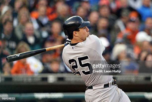Mark Teixeira of the New York Yankees hits a two run home run in the third inning off Brad Thomas of the Detroit Tigers during the game on May 10,...