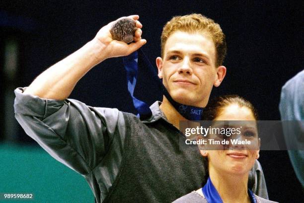 Winter Olympic Games : Salt Lake City, 2/12/02, Salt Lake City, Utah, United States --- David Pelletier Displays His Silver Medal As Partner Jamie...