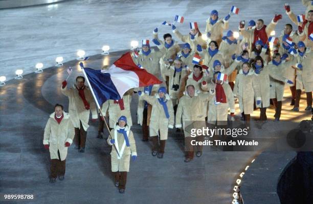 Winter Olympic Games : Salt Lake City, 02/8/2002, Salt Lake City, Utah, United States --- Led By Flagbearer Carole Montillet, A Member Of The Ladies...