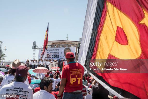 Andres Manuel Lopez Obrador presidential candidate for National Regeneration Movement Party / 'Juntos Haremos Historia' speaks as supporters wave the...