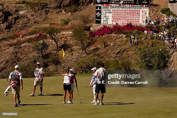 Lorena Ochoa of Mexico embraces playing partner Stacy Lewis on the 18th green following the fourth round of the Tres Marias Championship at the Tres...