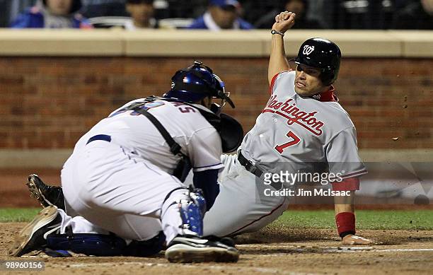 Ivan Rodriguez of the Washington Nationals is tagged out at the plate by Rod Barajas of the New York Mets to end the sixth inning on May 10, 2010 at...