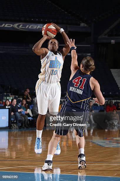 Epiphanny Prince of the Chicago Sky shoots over Tully Bevilaqua of the Indiana Fever during the WNBA pre season game on May 10, 2010 at the All-State...