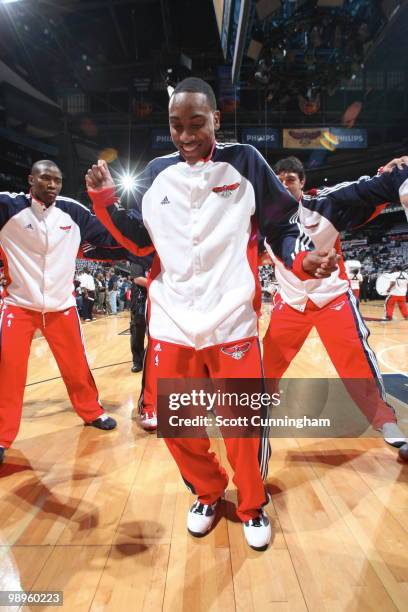 Jeff Teague of the Atlanta Hawks dances in the huddle before Game Four of the Eastern Conference Semifinals against the Orlando Magic in during the...