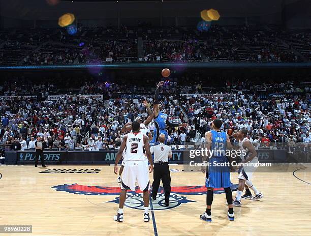 Dwight Howard of the Orlando Magic grabs the opening tip against Josh Smith of the Atlanta Hawks in Game Four of the Eastern Conference Semifinals...