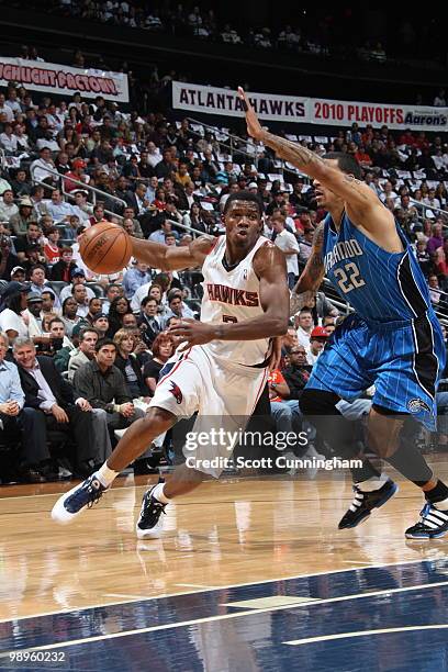 Joe Johnson of the Atlanta Hawks drives against Matt Barnes of the Orlando Magic in Game Four of the Eastern Conference Semifinals during the 2010...