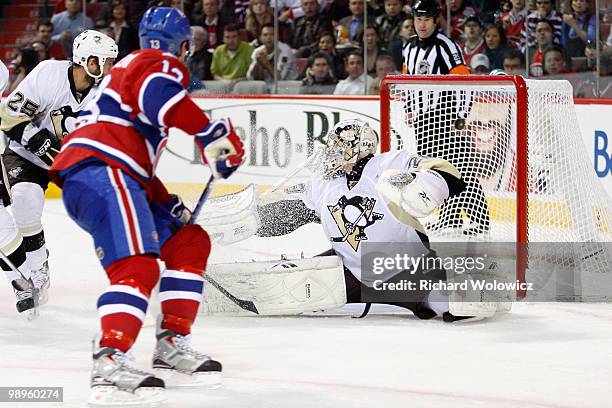 Mike Cammalleri of the Montreal Canadiens scores a goal on Marc-Andre Fleury of the Pittsburgh Penguins in Game Six of the Eastern Conference...