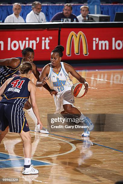 Epiphanny Prince of the Chicago Sky moves the ball during the WNBA pre season game against the Indiana Fever on May 10, 2010 at the All-State Arena...