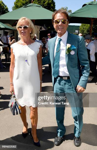 Sir Cliff Richard attends day one of the Wimbledon Tennis Championships at the All England Lawn Tennis and Croquet Club on July 2, 2018 in London,...