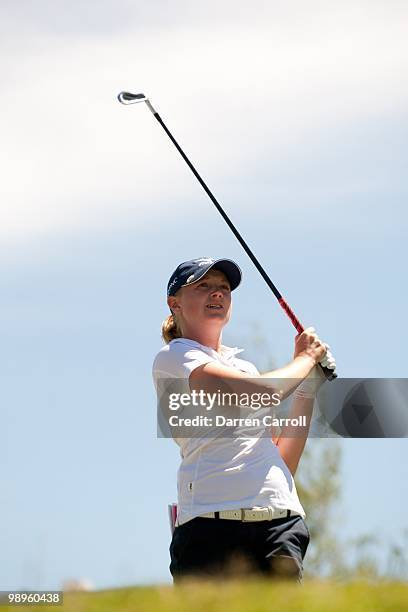 Stacy Lewis follows through on a tee shot during the fourth round of the Tres Marias Championship at the Tres Marias Country Club on May 2, 2010 in...