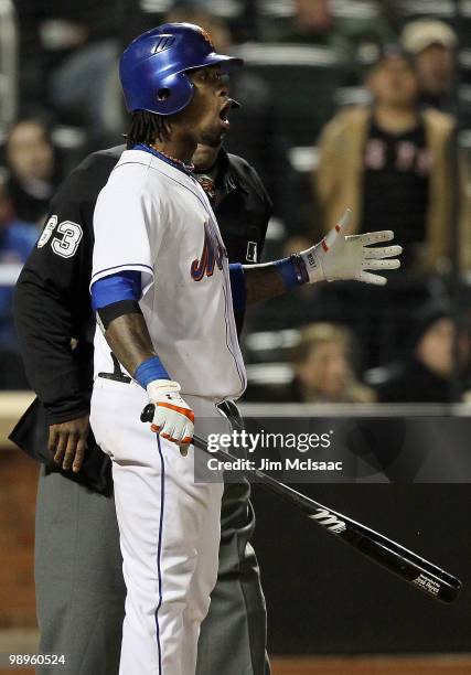 Jose Reyes of the New York Mets reacts after being called out on strikes to end the seventh inning against the Washington Nationals on May 10, 2010...