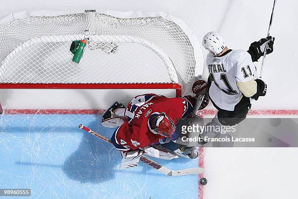 Jaroslav Halak of Montreal Canadiens blocks a shot of Jordan Staal of the Pittsburgh Penguins in Game Six of the Eastern Conference Semifinals during...