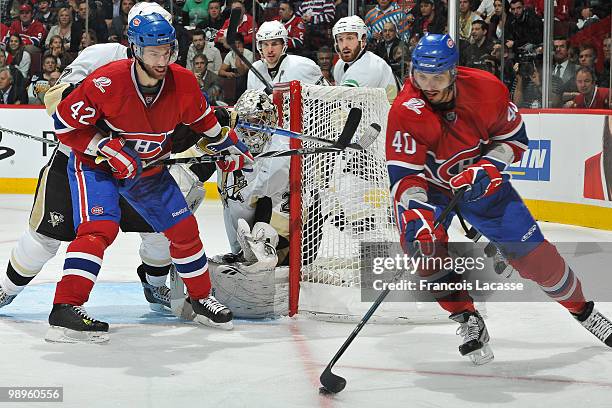 Maxim Lapierre of Montreal Canadiens takes a shot on goalie Marc-Andre Fleury of the Pittsburgh Penguins in Game Six of the Eastern Conference...