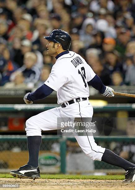 Johnny Damon of the Detroit Tigers hits a solo home run in the fifth inning to give the Tigers a 4-2 lead over the New York Yankees during the game...