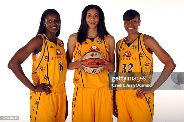 Delisha Milton-Jones, Candace Parker and Tina Thompson of the Los Angeles Sparks pose for a photo during WNBA Media Day at St. Mary's Academy on May...