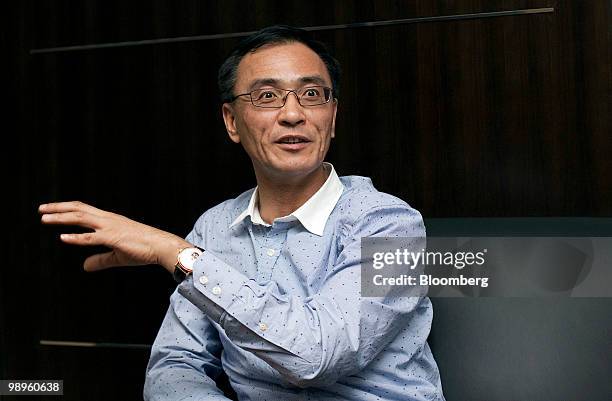 Chen Xiao, chairman and president of Gome Electrical Appliances Holdings Ltd., speaks during an interview at the company's headquarters in Hong Kong,...