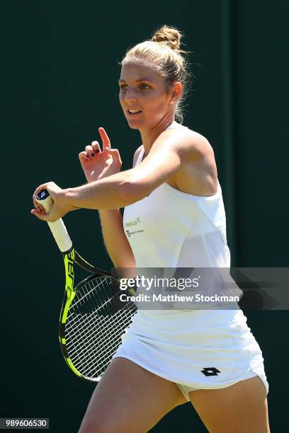 Kristyna Pliskova of Czech Republic returns to Alexandra Dulgheru of Romania during during their Ladies' Singles first round match on day one of the...