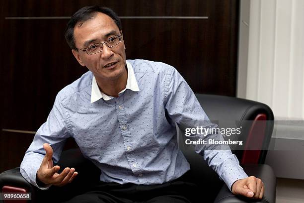 Chen Xiao, chairman and president of Gome Electrical Appliances Holdings Ltd., speaks during an interview at the company's headquarters in Hong Kong,...