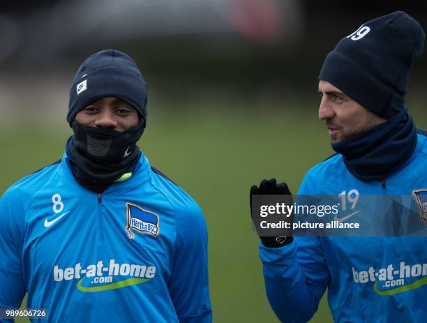 Hertha's Salomon Kalou and Vedad Ibisevic in conversation during the begin of the training of Hertha BSC in Berlin, Germany, 02 January 2018. Photo:...