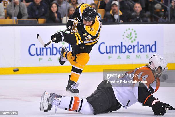 Milan Lucic of the Boston Bruins shoots the puck against the Philadelphia Flyers in Game Five of the Eastern Conference Semifinals during the 2010...