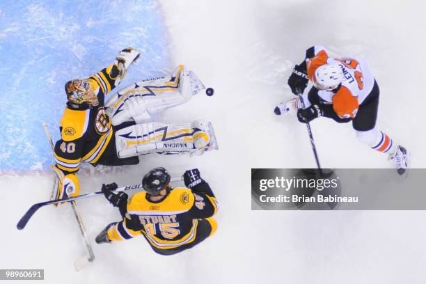 Tuukka Rask of the Boston Bruins makes a save against Ville Leino of the Philadelphia Flyers in Game Five of the Eastern Conference Semifinals during...