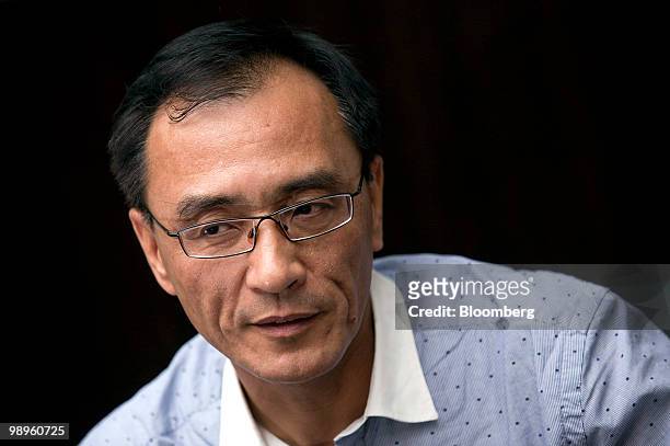 Chen Xiao, chairman and president of Gome Electrical Appliances Holdings Ltd., speaks during an interview at the company's headquarters in Hong Kong,...