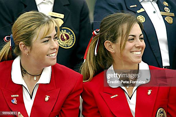 Paula Creamer and Erica Blasberg enjoy the closing ceremony of the Curtis Cup at the Formby Golf Club. June 13, 2004