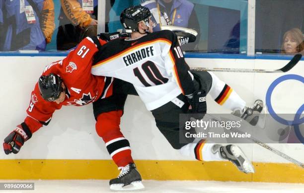 Winter Olympic Games : Salt Lake City, 2/17/02, Provo, Utah, United States --- Canada'S Steve Yzerman Collides With Germany'S Christian Ehrhoff While...