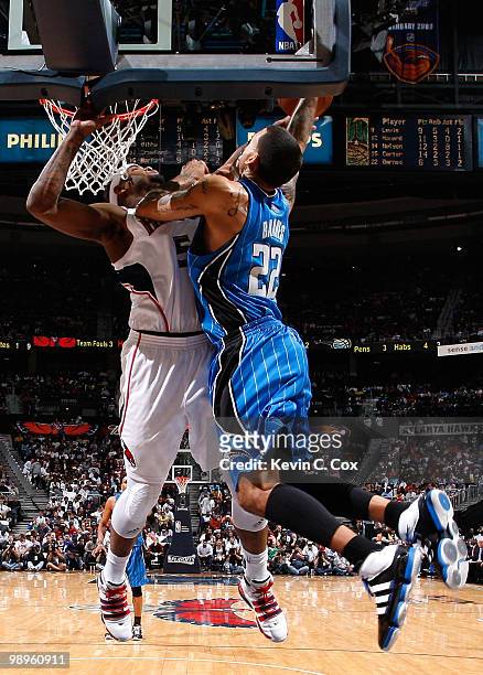 Josh Smith of the Atlanta Hawks blocks a dunk by Matt Barnes of the Orlando Magic during Game Four of the Eastern Conference Semifinals of the 2010...
