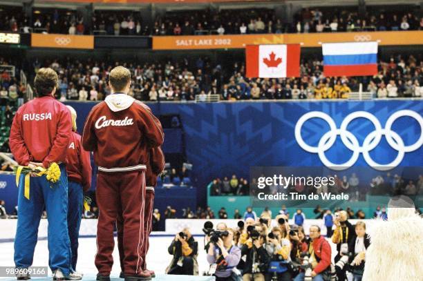 Winter Olympic Games : Salt Lake City, 2/18/02, Salt Lake City, Utah, United States --- As The Flags Of Their Respective Countries Are Raised,...