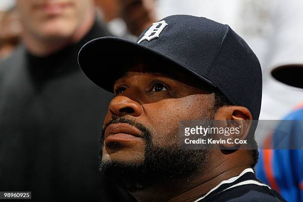 Former Pittsburgh Steeler Jerome Bettis watches the game between the Orlando Magic and the Atlanta Hawks during Game Four of the Eastern Conference...
