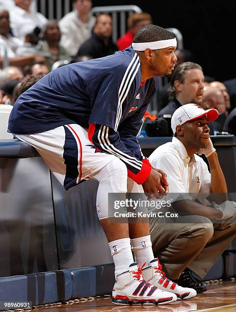 Josh Smith of the Atlanta Hawks waits to re-enter the game against the Orlando Magic during Game Four of the Eastern Conference Semifinals of the...