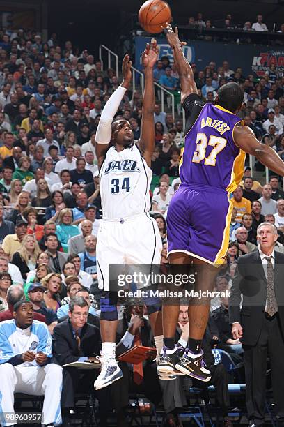 Miles of the Utah Jazz shoots an outside jumper over Ron Artest of the Los Angeles Lakers in Game Four of the Western Conference Semifinals during...