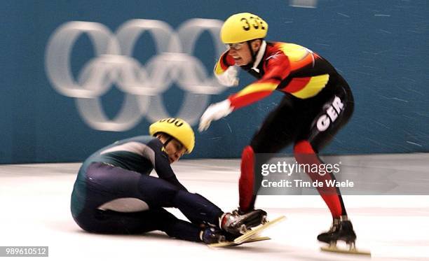 Winter Olympic Games : Salt Lake City, 2/20/02, Salt Lake City, Utah, United States --- Short Traqck Speed Skater Andre Hartwig Of Germany Tries To...